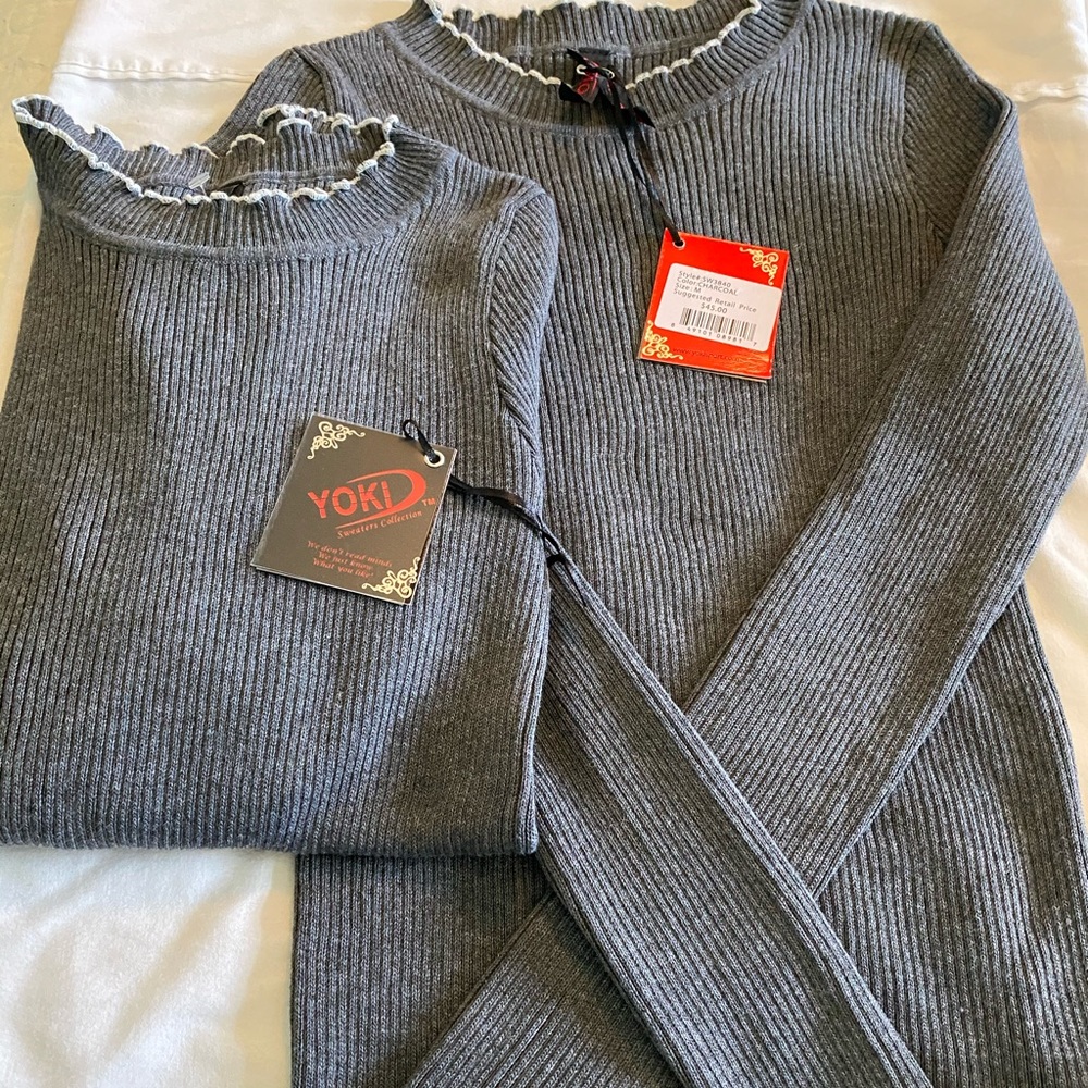 Yoki Sweater With Ruffled Edge.